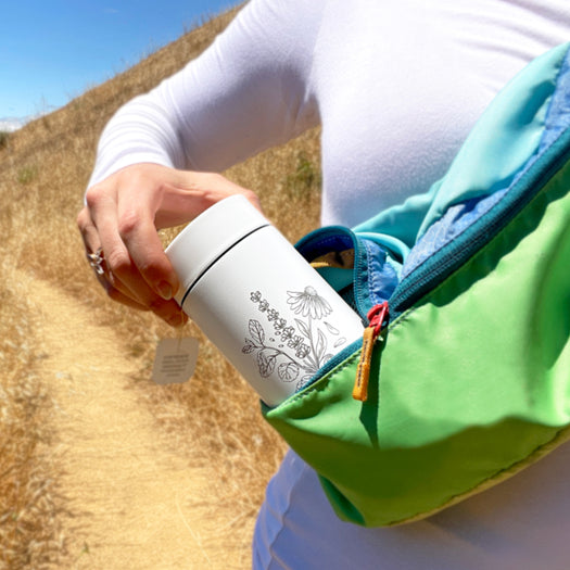 photo of someone holding the Travelers Tranquility Set bottle